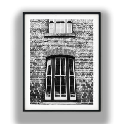 Vintage Arched Sash Windows on Brick Facade Black and White Print