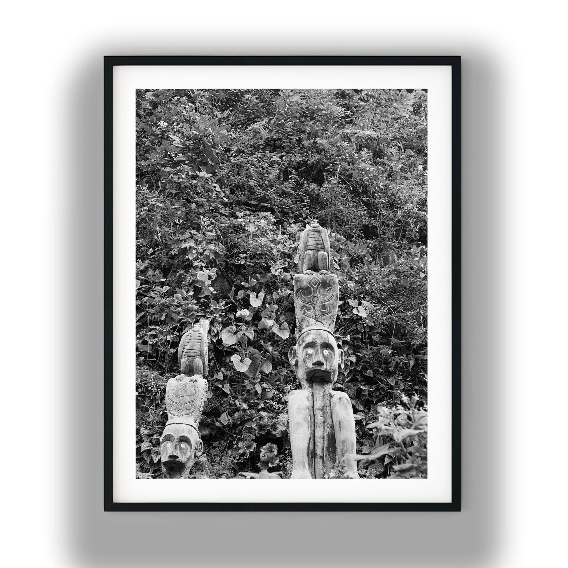 Carved Wooden Totem Poles in Lush Foliage Black and White Print