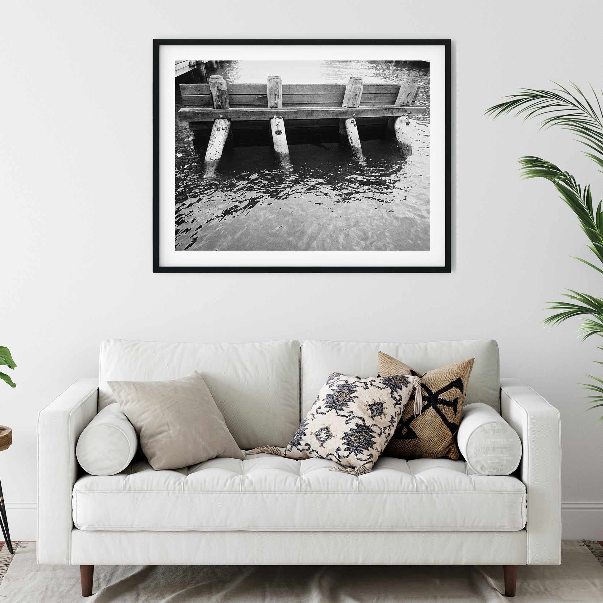 Rustic Wooden Pier Pilings in Water Black and White Print