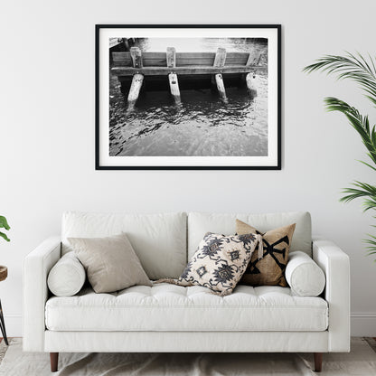Rustic Wooden Pier Pilings in Water Black and White Print
