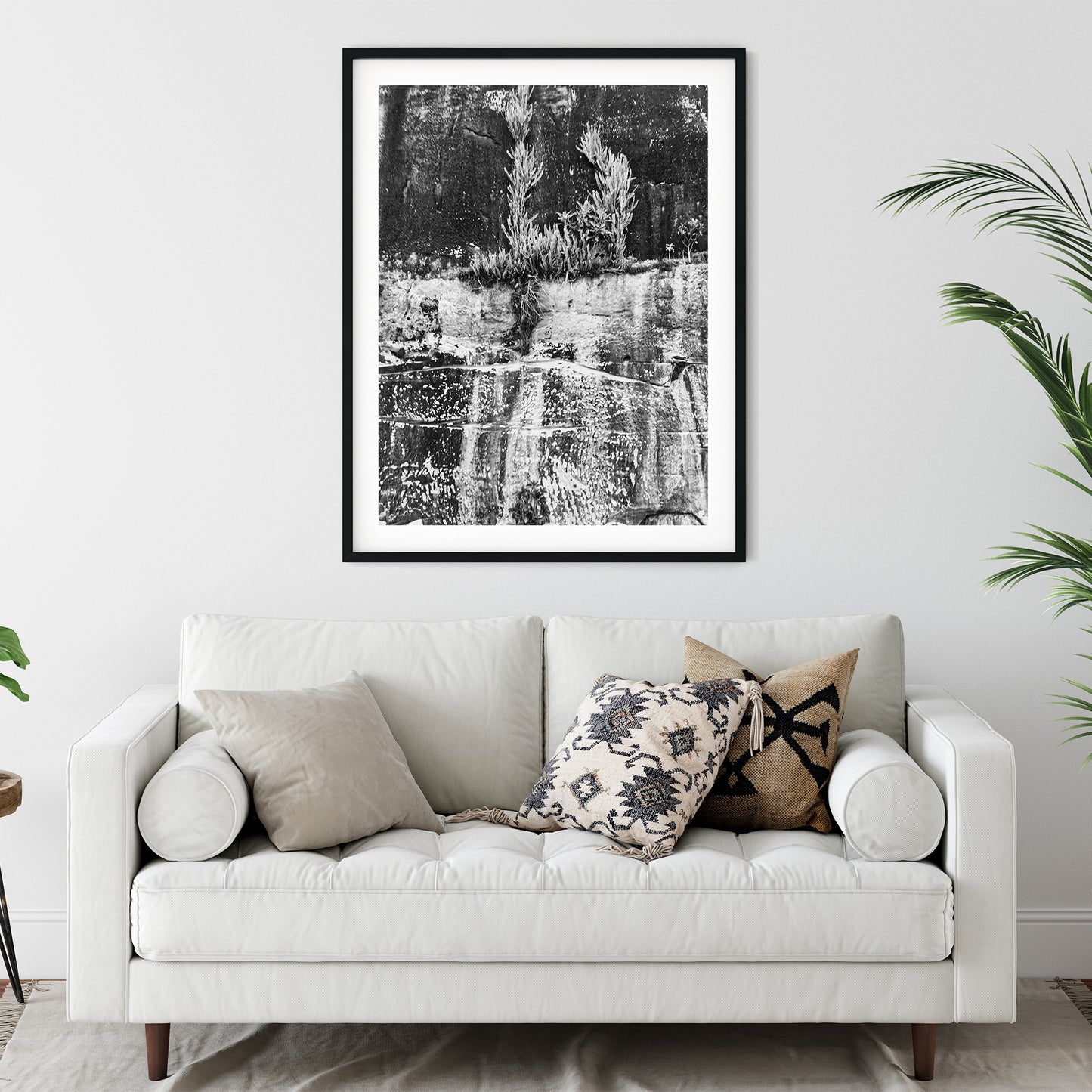 Resilient Plants on Weathered Rock Cliff Face Black and White Print