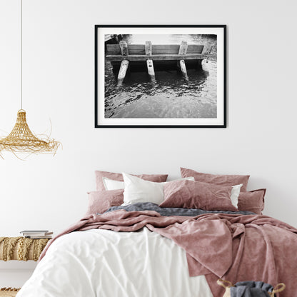Rustic Wooden Pier Pilings in Water Black and White Print